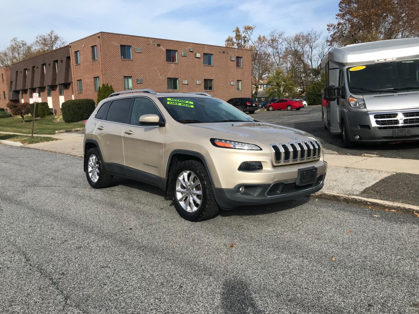 2015 Gold /Black Jeep Cherokee Limited (1C4PJMDS5FW) with an 3.2 V6 engine, Automatic transmission, located at 577 Chester Pike, Prospect Park, PA, 19076, (610) 237-1015, 39.886154, -75.302338 - Photo#2